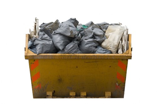 Professional office clearance team organizing office items in Highgate